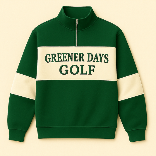 Green and cream quarter-zip golf sweater with bold “Greener Days Golf” lettering, retro athletic pullover with contrast panel design.