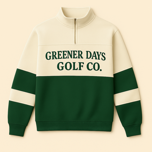 Green and cream quarter-zip golf sweater with bold “Greener Days Golf” lettering, retro athletic pullover with contrast panel design.